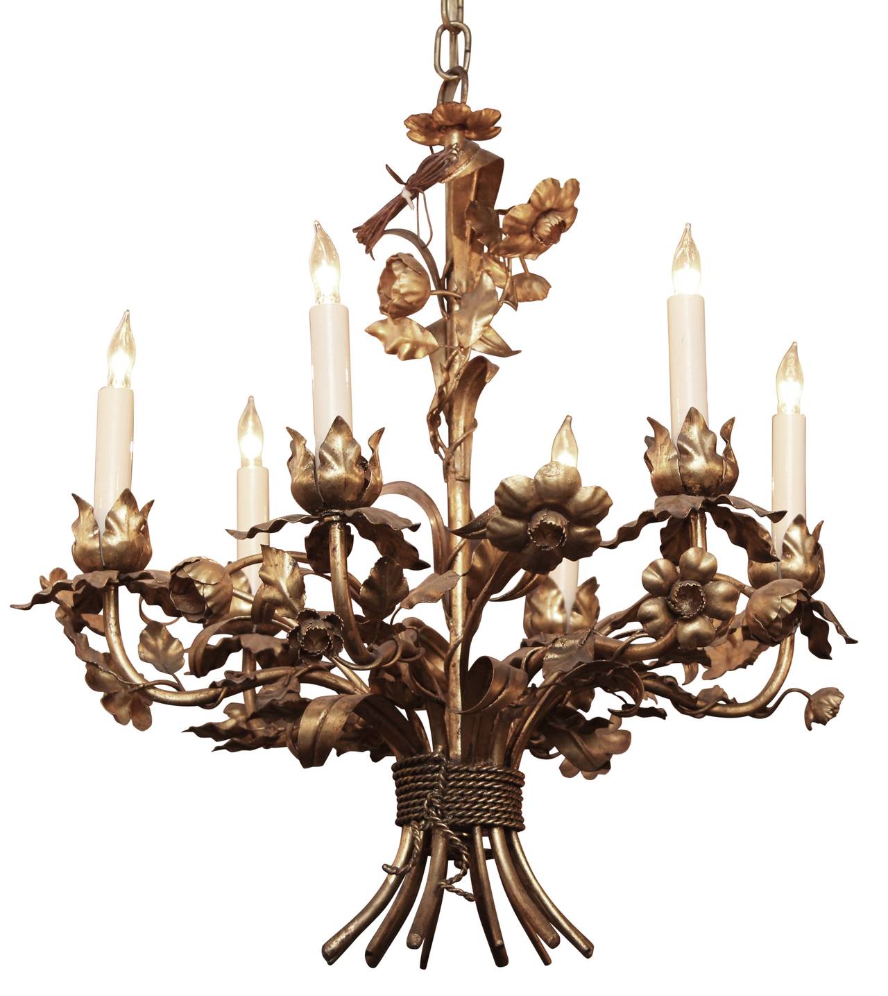 Floral chandelier made of gilt metal. Seen in a wheat and floral motif, it has rope detailing at the bottom and six lights. Made in Italy in the 1950s. This item can be viewed at our 302 Bowery locations in Manhattan.