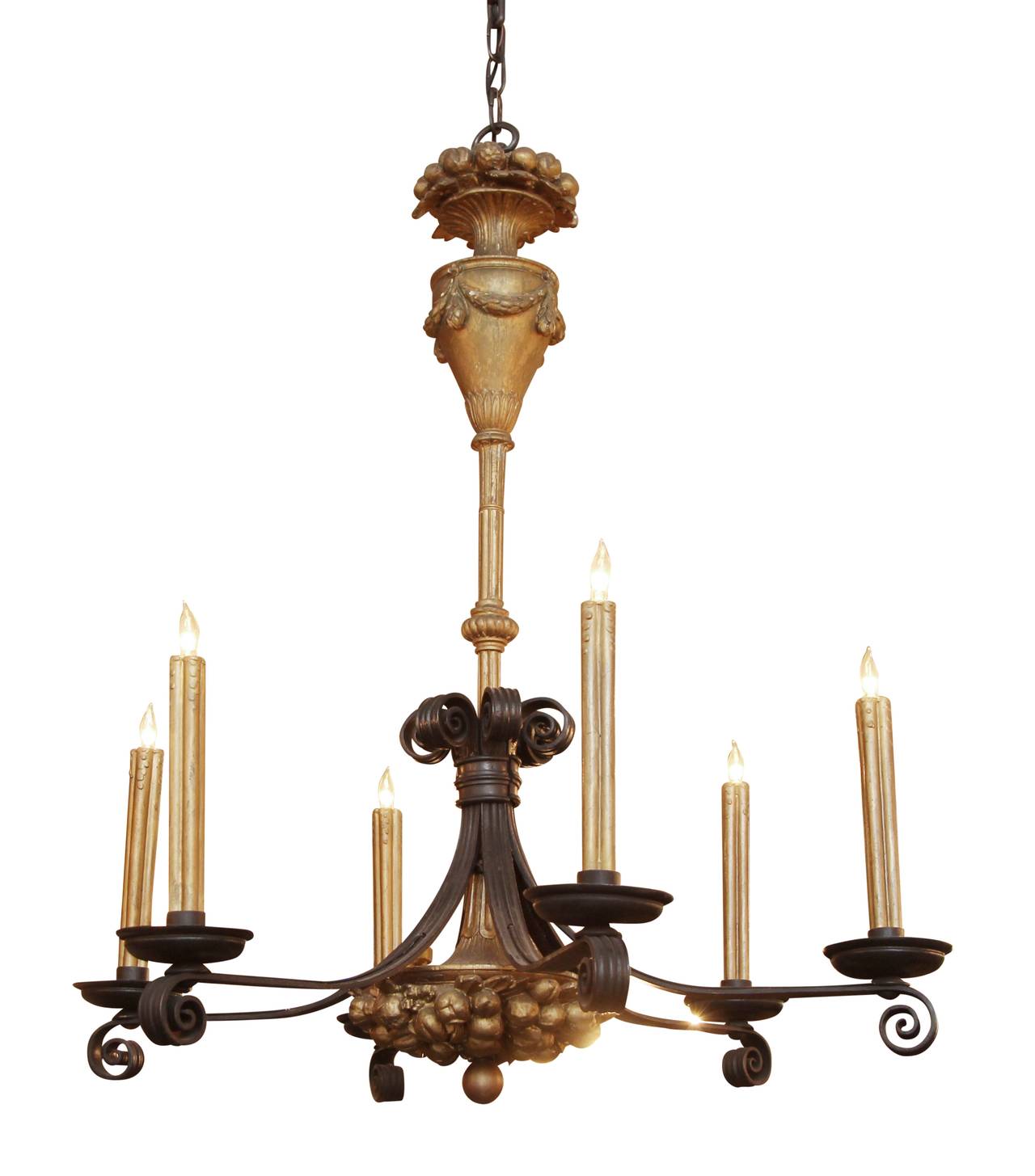 Neoclassical style black and gold French chandelier made of iron and gesso, circa 1930s. This item can be viewed at our 302 Bowery location in Manhattan.