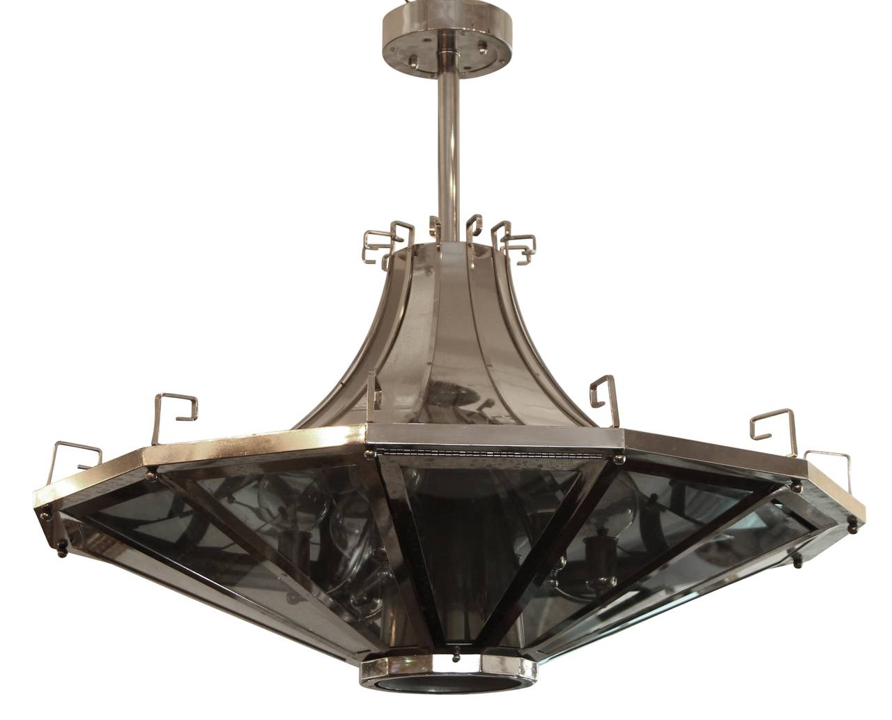 Modern spaceship shaped light fixture with Greek detailing on top. French made in the 1950s. Small quantity available at time of posting. Please inquire. Priced each. This can be seen at our 400 Gilligan St location in Scranton, PA.