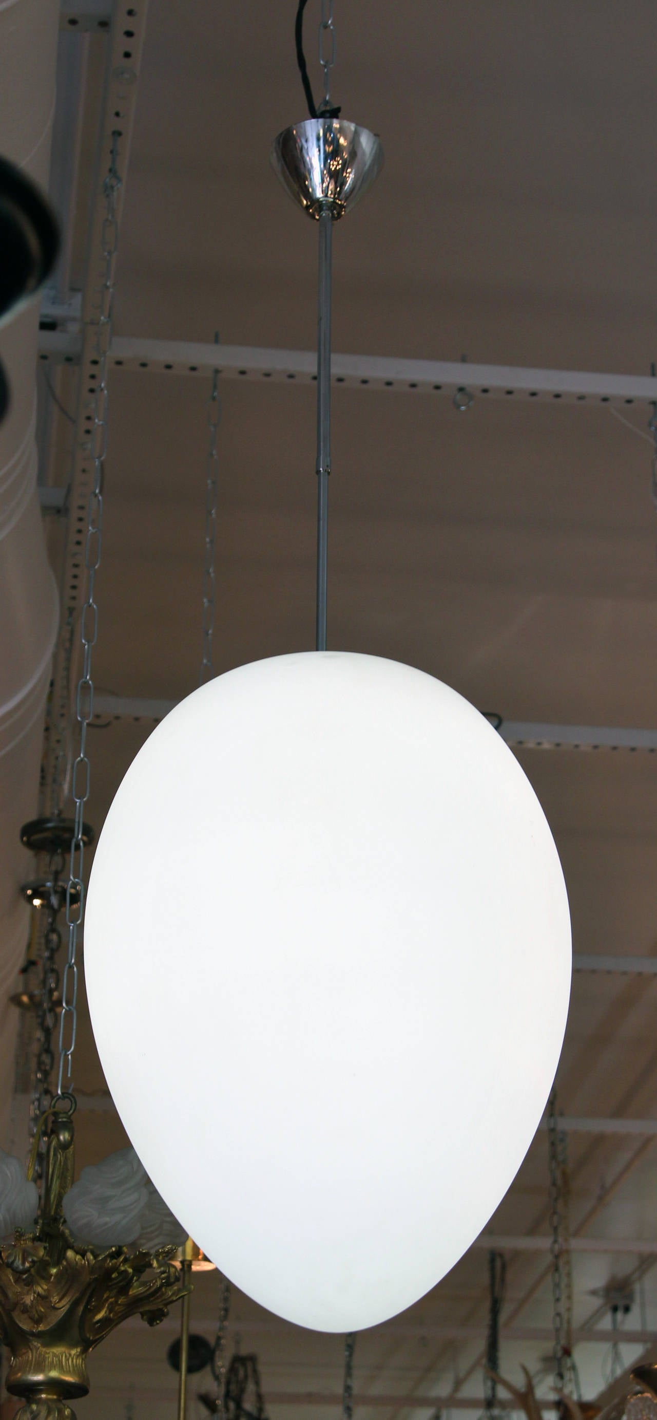 Large 'egg' pendant fixture. Italian made in the 1960s by Fontana Arte. This item can be viewed at our 302 Bowery location in Manhattan.