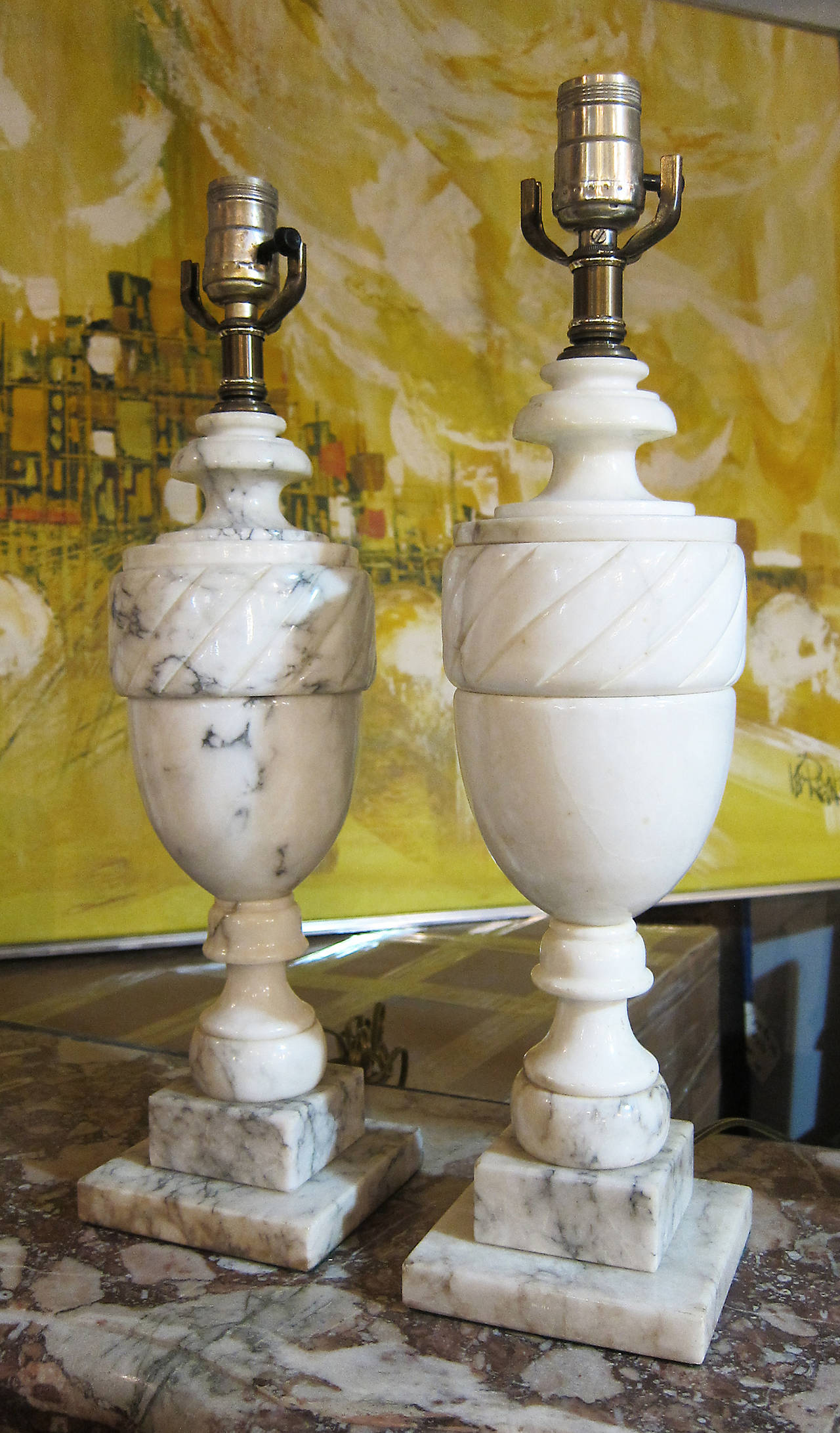 Pair of French made alabaster urn shaped table lamps from the 1940s presented in a neoclassical style. These can be viewed at our 5 East 16th St, Union Square location in Manhattan.