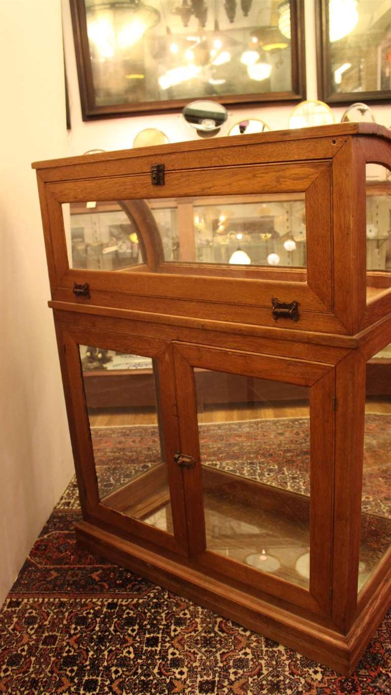 antique curved glass display case