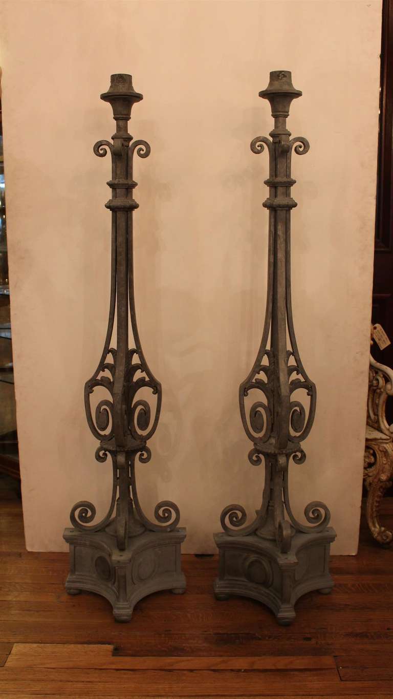 1920s exterior stoop or patio iron torchiere lights that are zinc plated. Priced for the pair. Need rewiring. This can be seen at our 400 Gilligan St location in Scranton, PA.