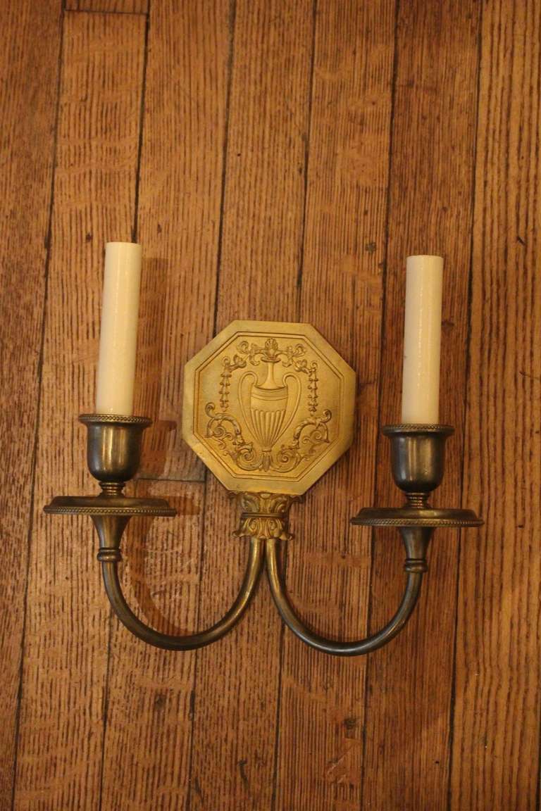 A pair of nicely done sconces stamped Caldwell. These can be seen at our 149 Madison Ave store in Manhattan.