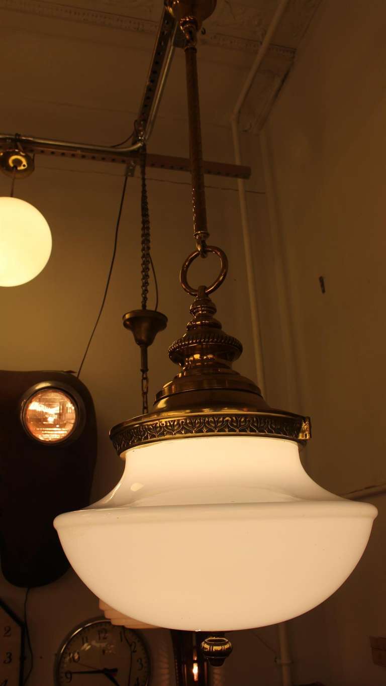 Pair of Large Milk Glass and Brass Pendant Lights 1