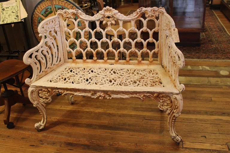 Painted cast iron garden bench made by Kramer Bros Foundry. This style is called a 