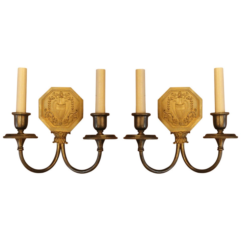 Pair of Caldwell Brass Sconces with Urn Motif