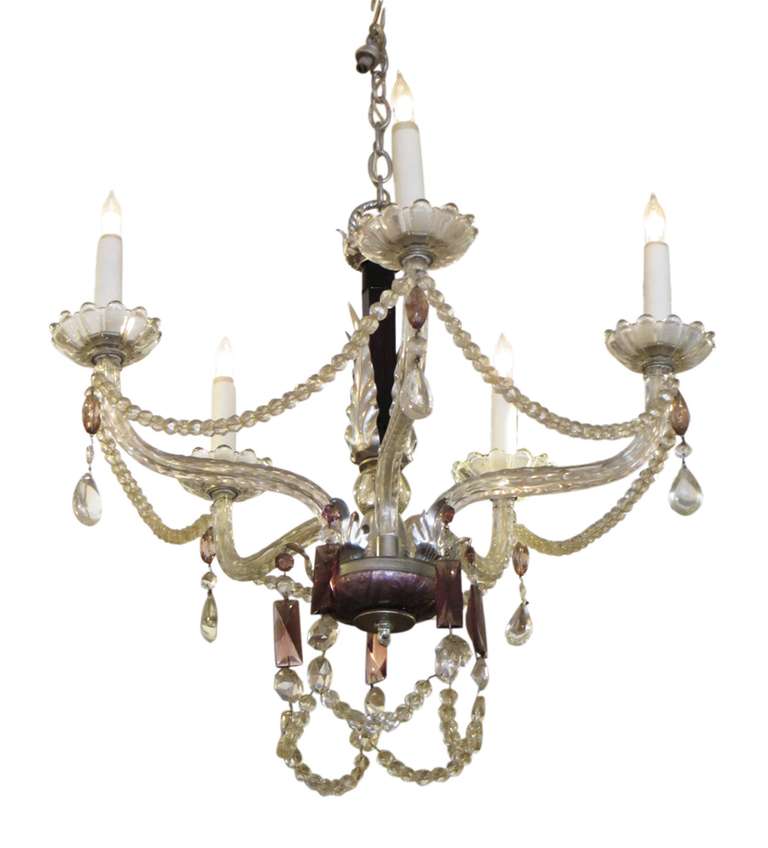 Five arm chandelier is finished with an amethyst crystal dish and crystals. The column is black glass with aluminum foliage details. Cleaned and rewired. Please note, this item is located in one of our NYC locations.