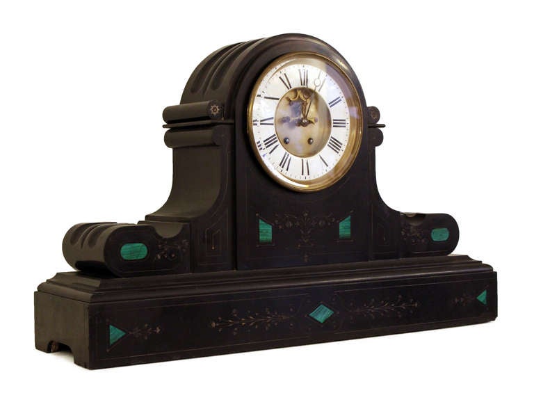 Turn of the century Victorian slate mantel clock. With key. Brass Victorian face plate. Working condition unknown. Some small chips, please see photo. Please note, extremely heavy as body of clock is slate.