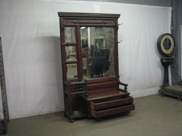 American Late 1800s Beveled Pier Mirror with Coat Hooks and Umbrella Stand