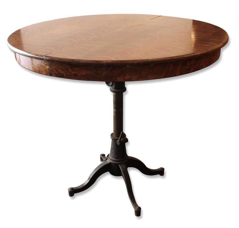 Antique oak table top married to an antique industrial drafting table base. Adjustable height.  This item can be viewed at our 149 Madison Ave location in Manhattan.