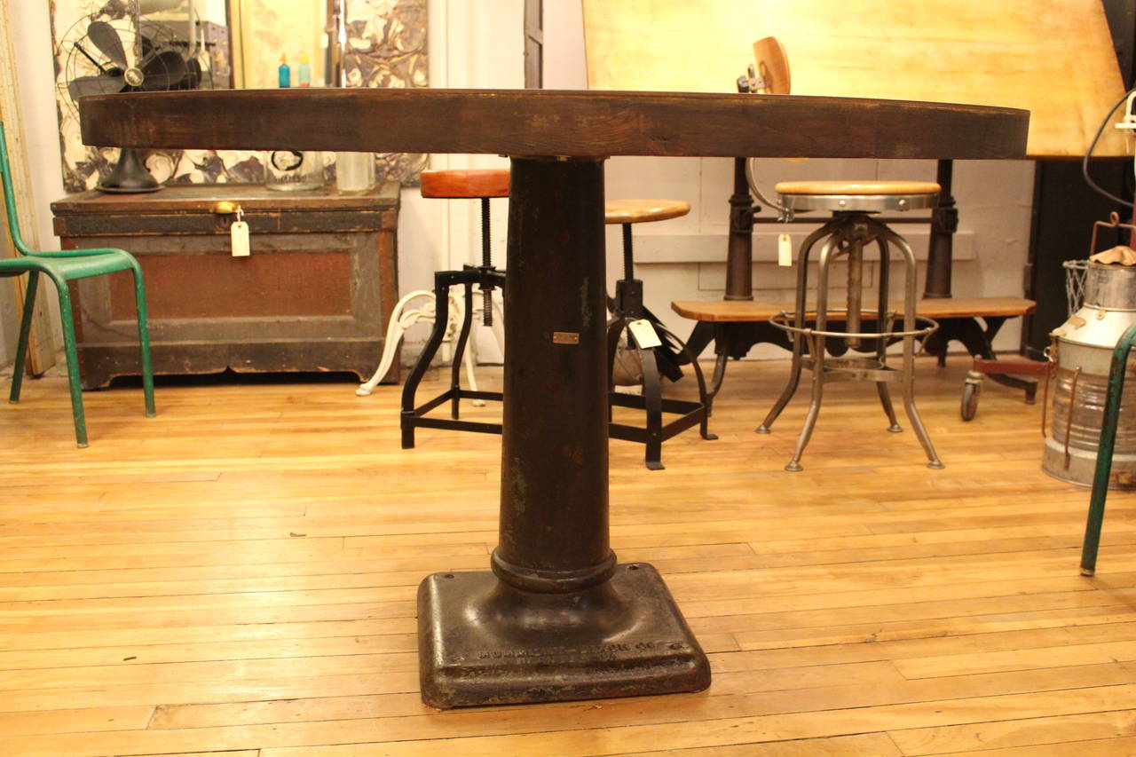 Round Hot Rolled Steel Table with Bolts and Industrial Machine Pedestal Base In Excellent Condition In New York, NY