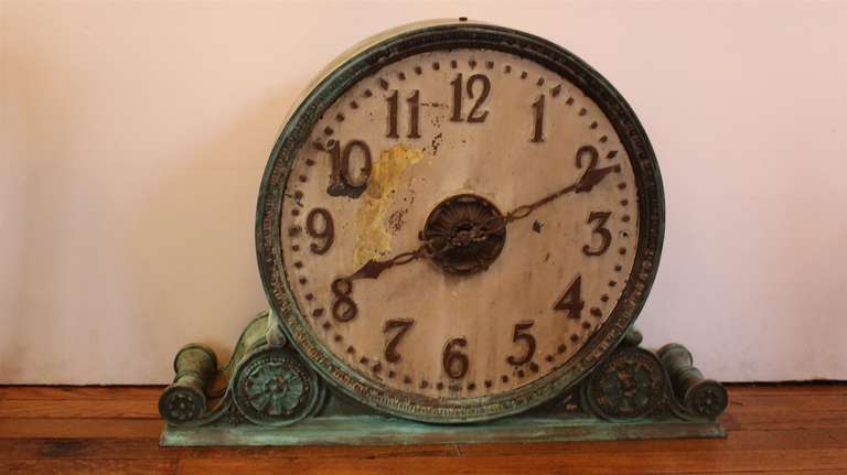 This bronze clock was salvaged from a bank. Unsure of its working condition. This item can be seen in our 149 Madison Avenue location in New York.