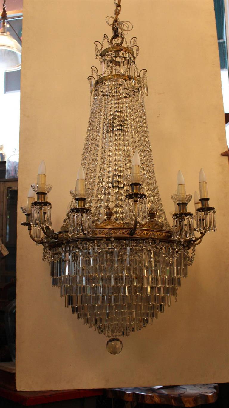 This 1927 beautiful antique crystal chandelier comes with 12 tiers and features original crystals and beads. Salvaged from the old Allyn Theater in Downtown Hartford, CT. This can be seen at our 2420 Broadway location on the upper west side in