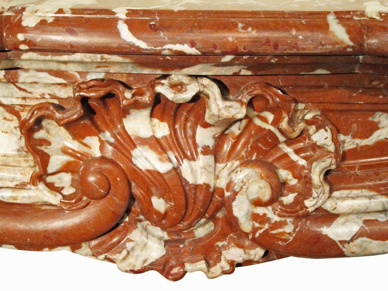 Fabulous Louis XV period red and white Rosa marble mantel with hand-carved center shell motif. This is one of several additions from Danny Alessandro & Edwin Jackson mantel company. This can be viewed at our 400 Gilligan St warehouse in Scranton, PA.