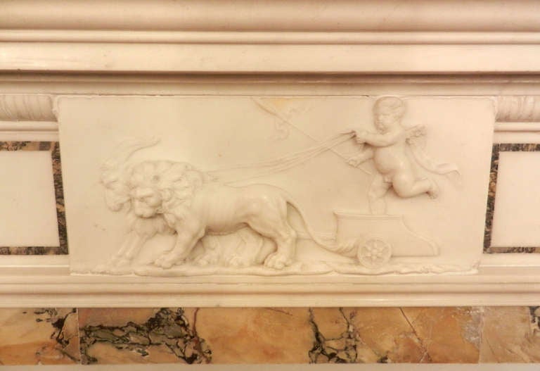 American Georgian Mantel with a Sienna Inlay and Cherub and Chariot Carving