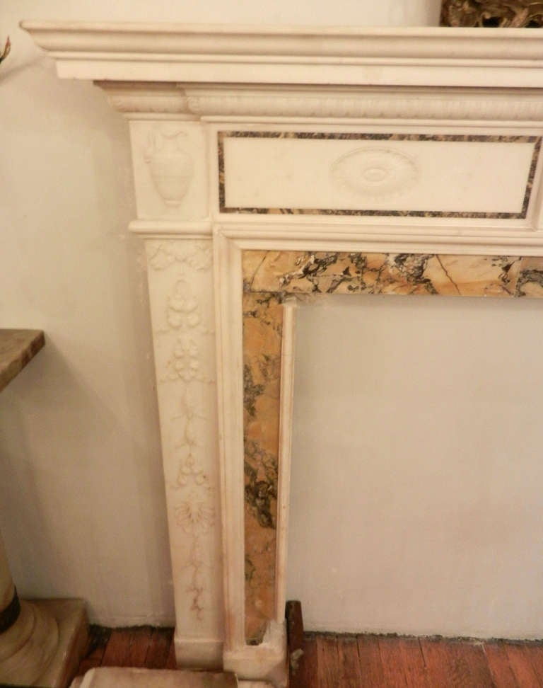 Georgian Mantel with a Sienna Inlay and Cherub and Chariot Carving In Excellent Condition In New York, NY
