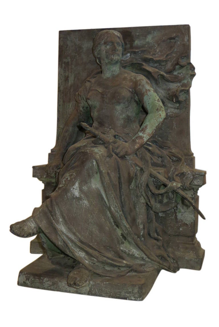 A very detailed bronze statue of a woman representing justice. It has a natural patina and is signed by the French artist Eugene Paul Benet. (Dieppe, July 13, 1863 - Paris, 1942). This can be seen at our store at 5 East 16th St in Union Square in