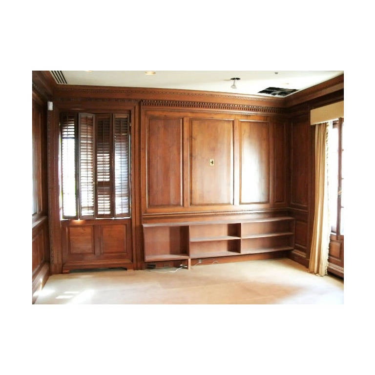 This is an all original antique knotty pine paneled room from one of New York City's prestigious upper East side buildings. It is all solid carved wood. The details are magnificently carved. Modern day carpenters try to reproduce this look, but