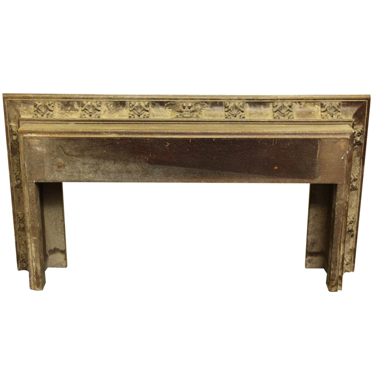 18th century wooden chimney mantel with carved details from France. Slightly worn. Please note, this item is located in our Scranton, PA location.