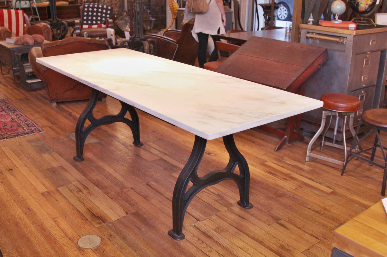 Gold Calcutta marble top reclaimed from a New York City historical
building. The marble is set on an industrial leg base. The color of the
marble is slightly warmer in color in person. This table can be customized
in other sizes and with bases.