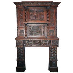 Heavily Carved Wooden English Tudor Mantel with Figures