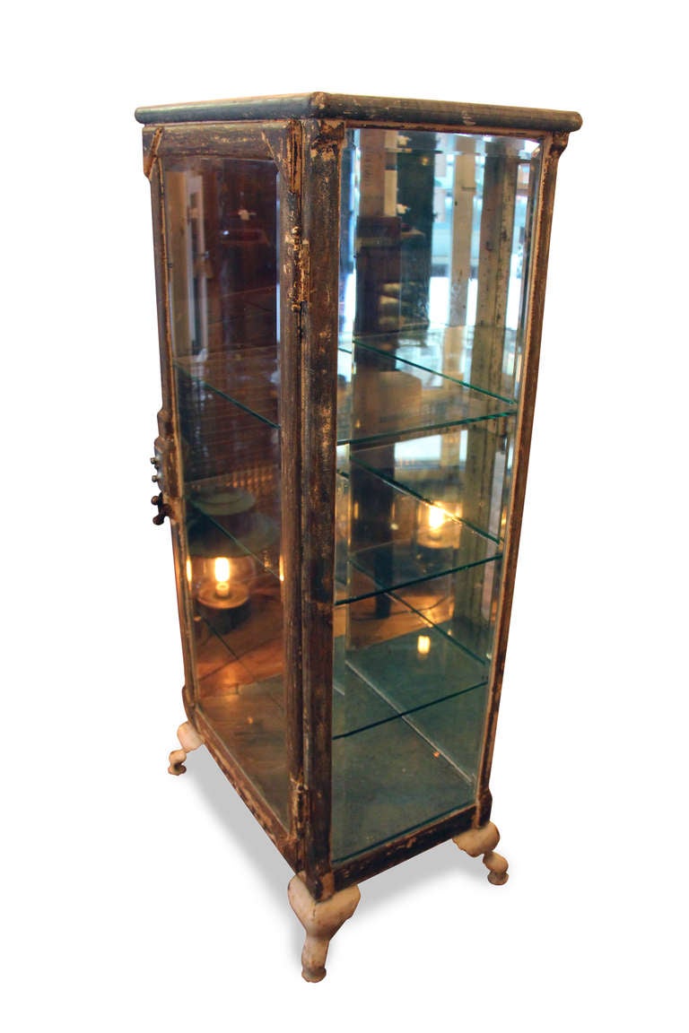 Very rare medical cabinet with desirable weathering throughout. Original glass and combination lock in perfect condition.