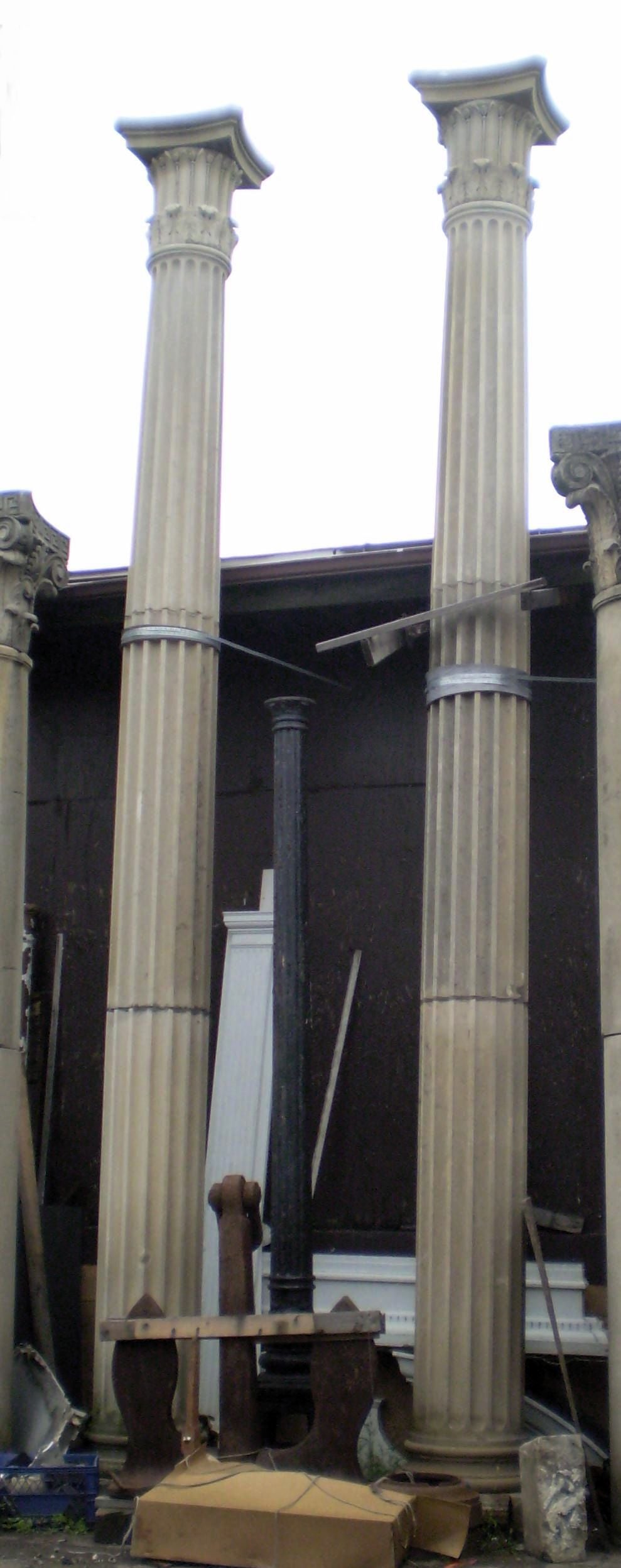 Pair of Tall Limestone Columns with Doric Capitals