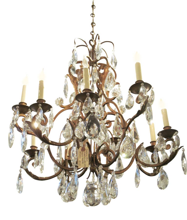 French iron chandelier with high quality faceted crystals. This can be seen at our 2420 Broadway location on the upper west side in Manhattan.