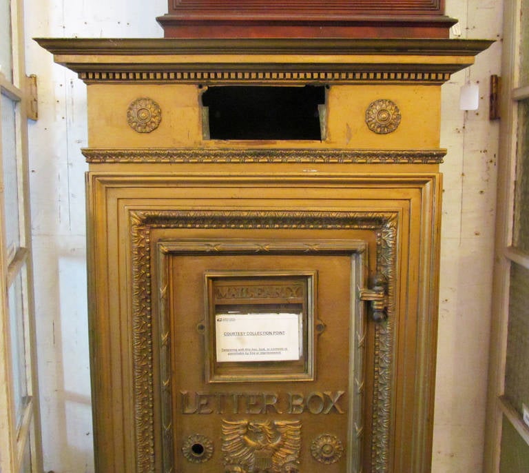 Bronze mail box salvaged from a Manhattan lobby. Attached under the box is an ornate bronze corbel. This item is located at our 124 West 24th Street, Manhattan location.