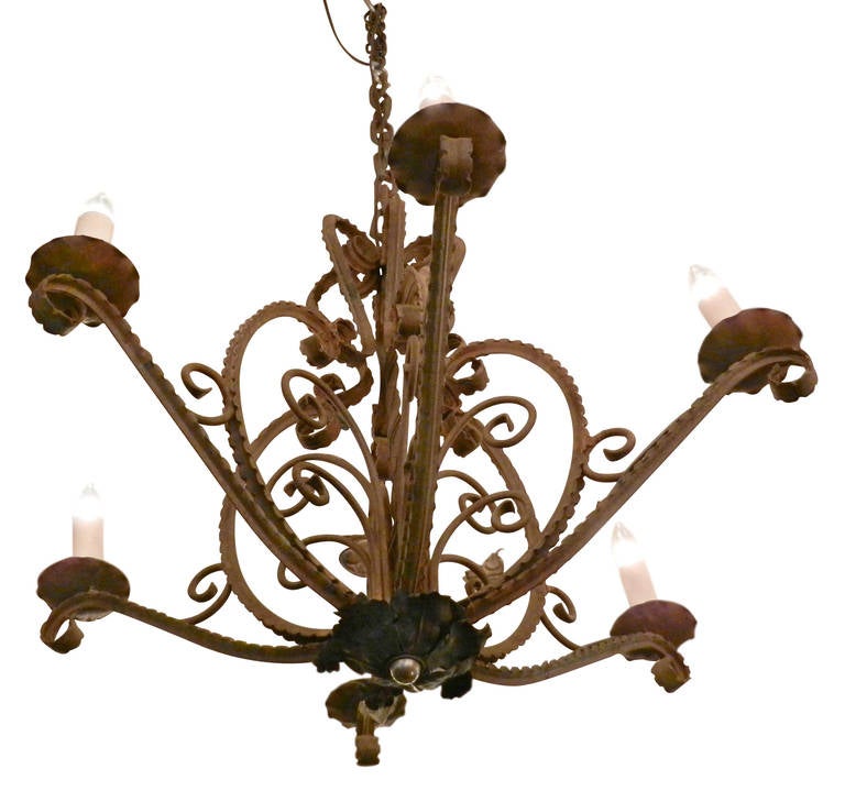 1950 French country wrought iron six-arm chandelier with heart and scroll motif. Please note, this item is located in our Los Angeles, CA location.