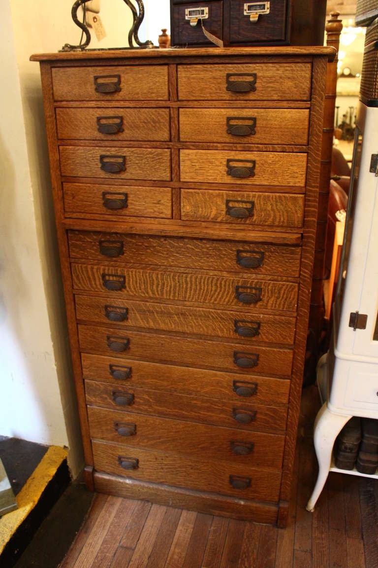 Handsome quarter sawn oak flat file cabinet with original hardware and a light patina throughout. This can be seen at our 400 Gilligan St, Scranton, PA warehouse.