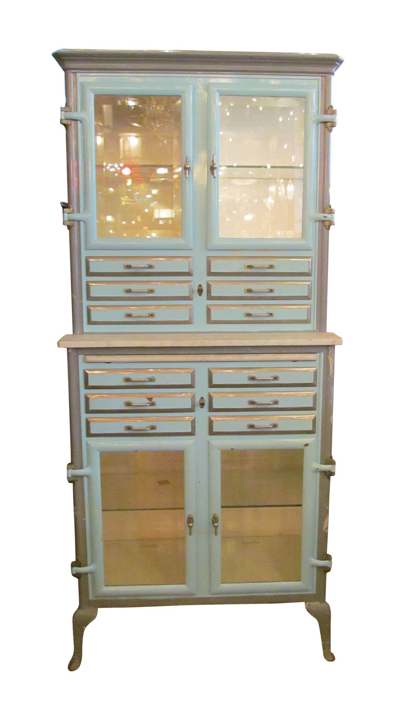 Made of metal with a marble ledge. Made in France. It features 12 drawers and two cabinets. This item is located at our 149 Madison Ave, New York, NY location.