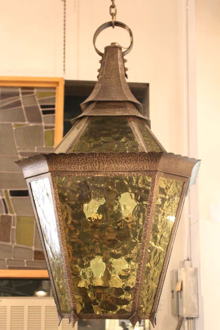 Large hammered brass and original amber glass lantern pendant with all original chain and canopy. It comes from Surf Avenue on Coney Island. Several available at time of posting. This can be seen at our 2420 Broadway location on the upper west side