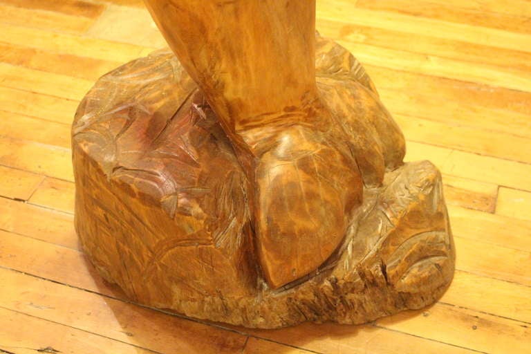 wood dolphin sculpture