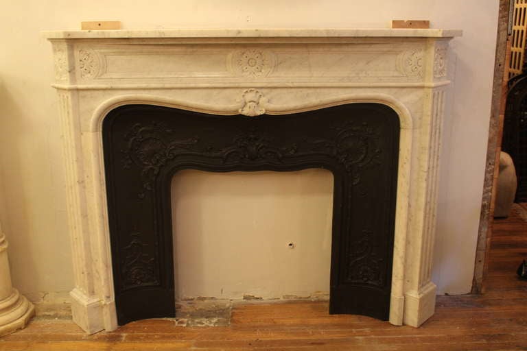 French curved style with beautiful carved details. The pictures show its original place in The Plaza Hotel. Mirror not included. This can be seen at our 149 Madison Ave location in Manhattan.