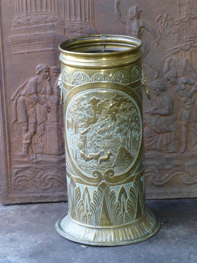 Beautifully crafted brass fire tool stand depicting a hunting scene