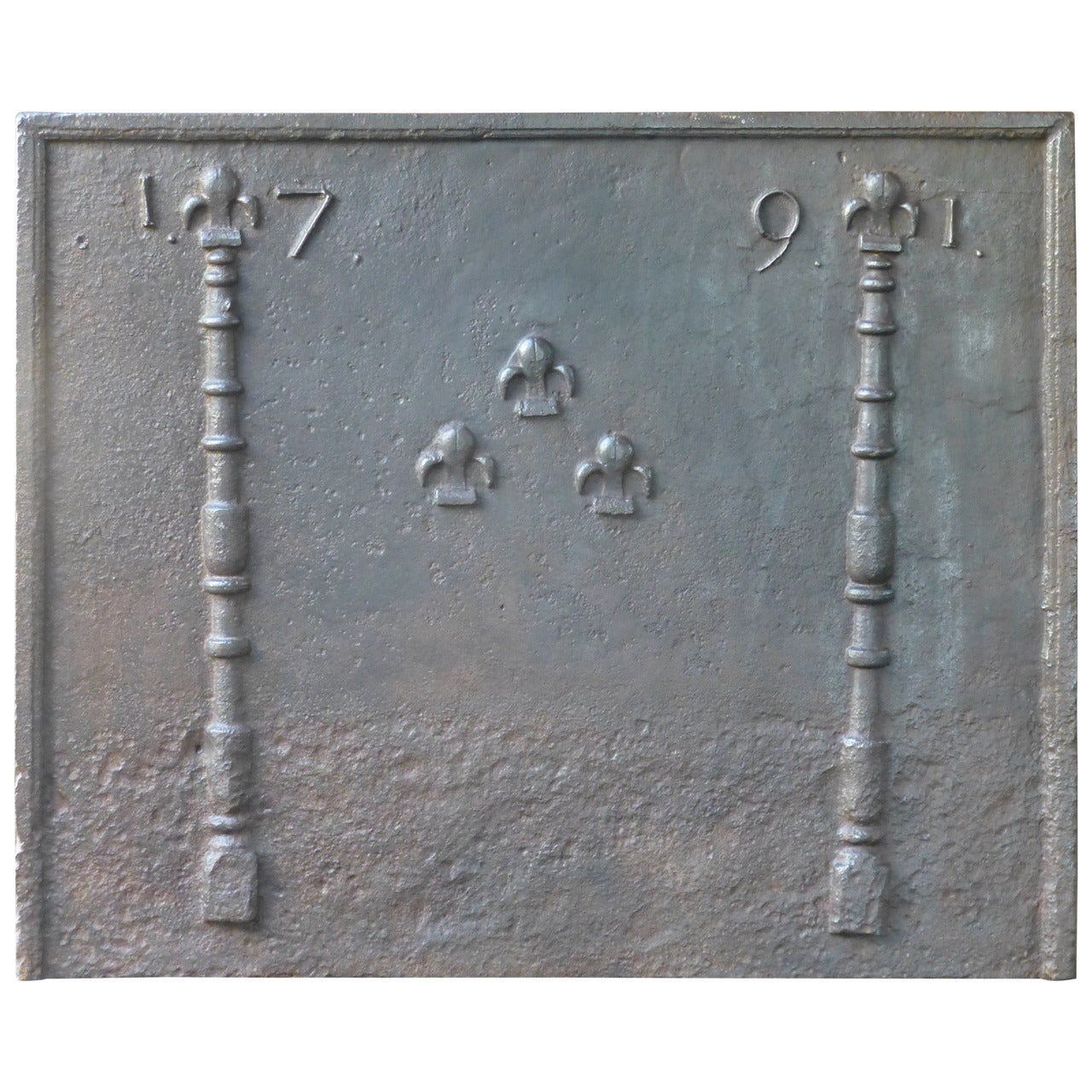 Plaque de cheminée du 18e siècle avec éclats de lys, datée de 1791 en vente