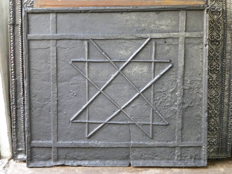 Gothic fireback from the early days of casting firebacks. Fireback with the Solomon Cross of the Solomon Knot. Because the symbol does not have a visible beginning or ending it represents eternity.

