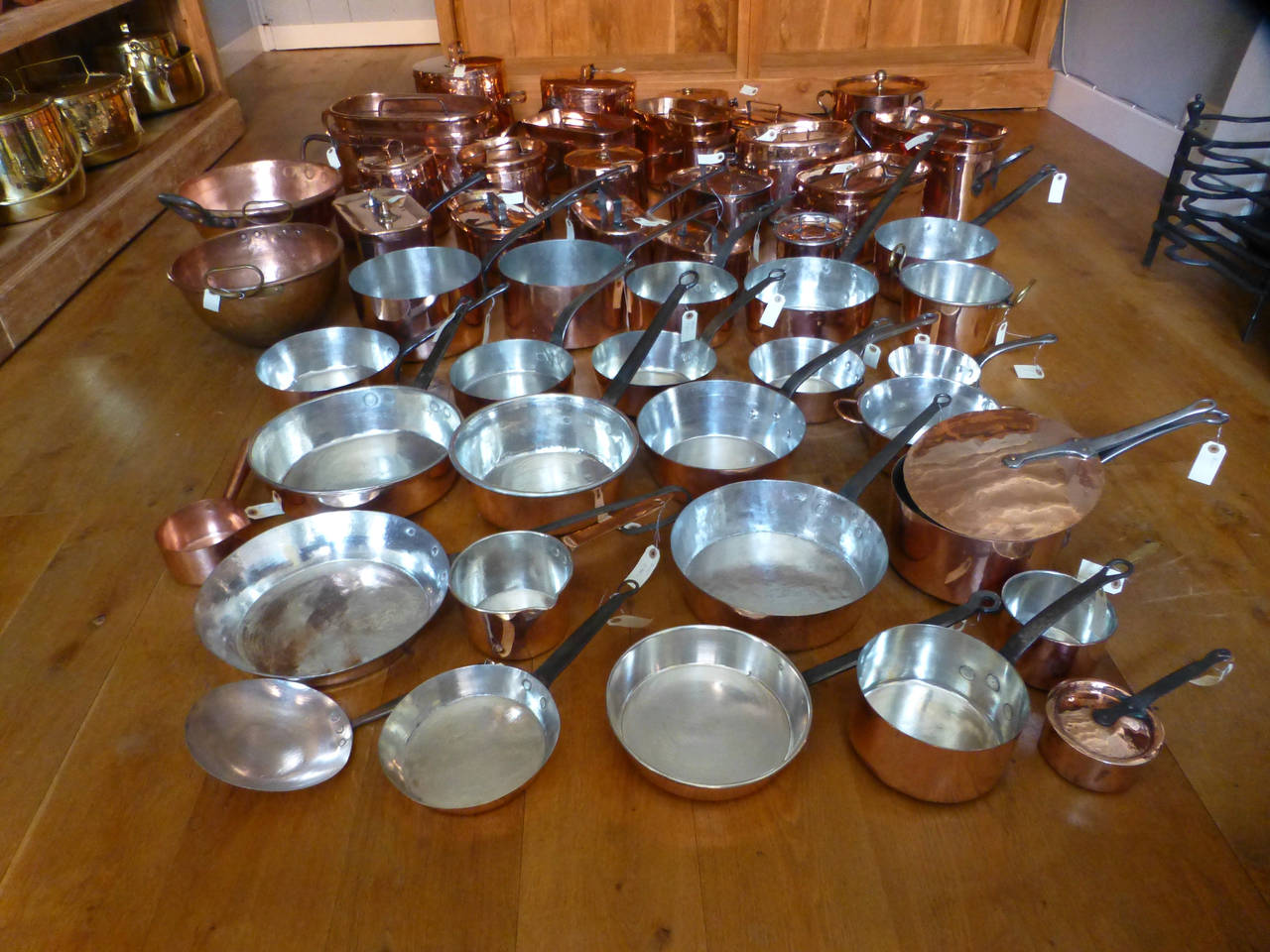 Collection of 50 French newly polished and re tinned antique copper pans. The collection is not only very decorative, but in addition all copper pans (except one) are ready to use in the kitchen:

12 copper stewing pans - stewpots (19th century,