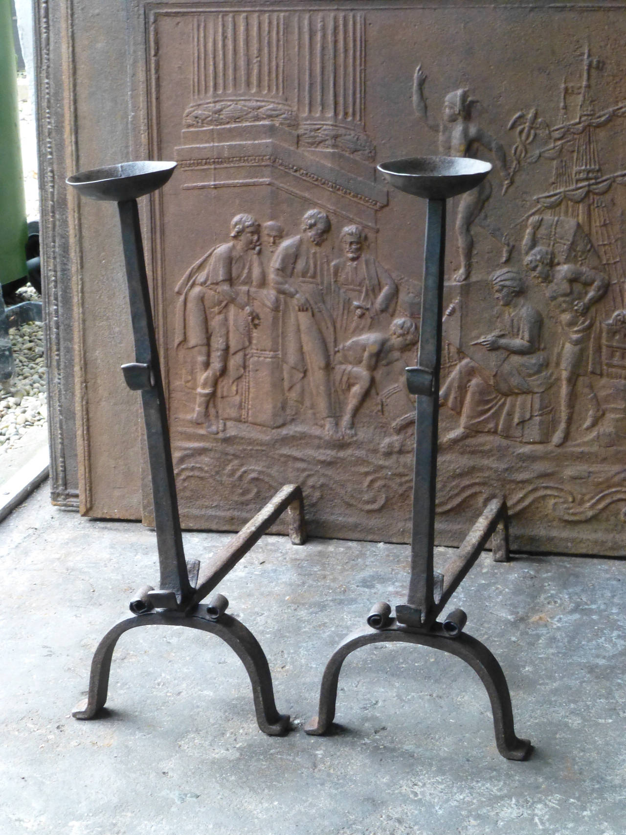 18th Century Wrought Iron Firedogs. These French andirons are called 'landiers' in France. This dates from the times the andirons were the main cooking equipment in the house. They had spit hooks to grill meat or poultry and sometimes a cup to keep