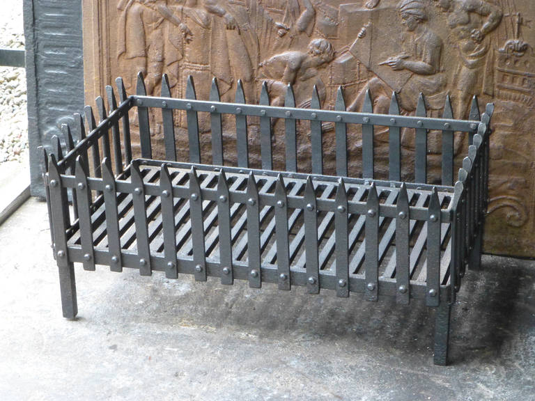 Wrought iron basket with cast iron bottom.