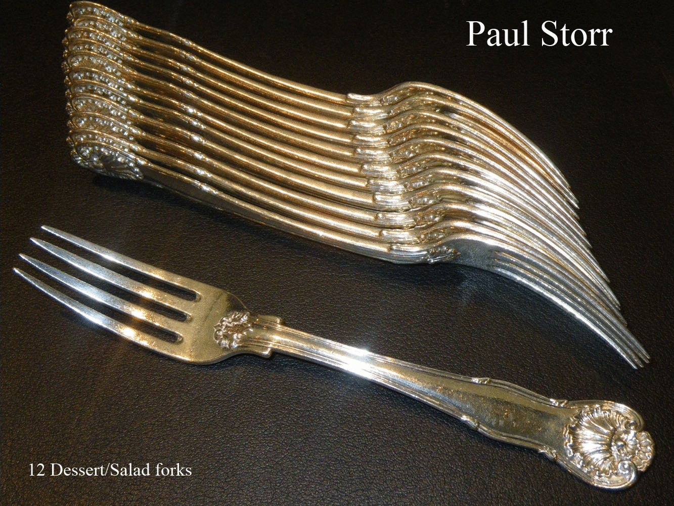A superb set of 12 Kings Husk pattern dessert or salad forks by the Royal Goldsmith