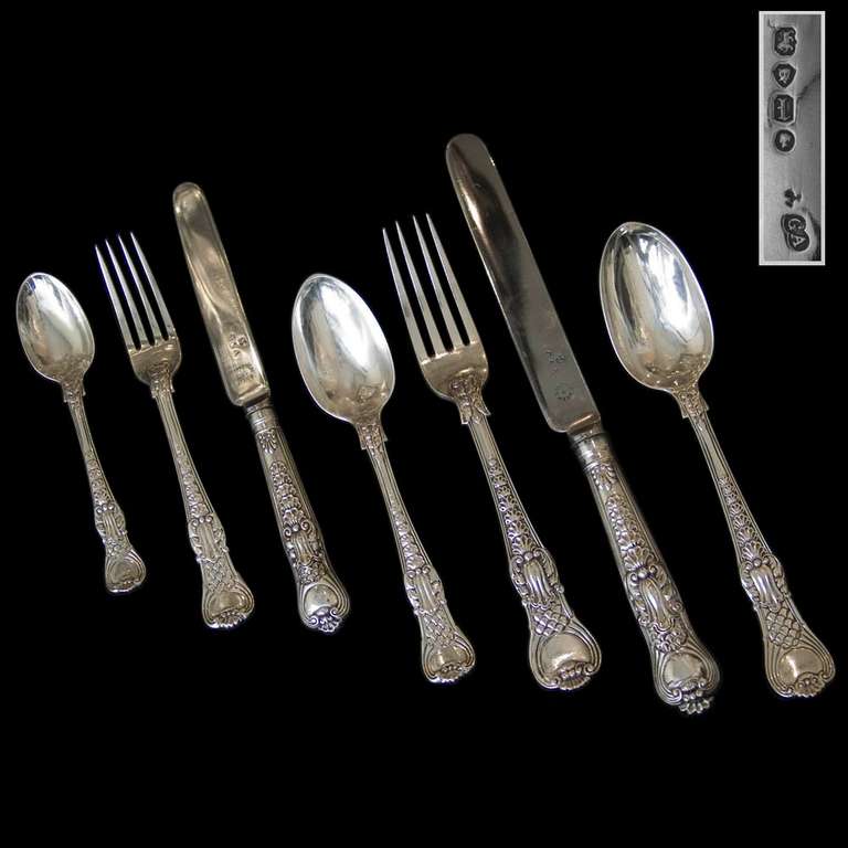A rare Victorian silver set for twelve of Coburg pattern flatware all by George Adams except for 1 table fork and 1 table knife by Henry Holland. 

Signed/Inscribed/Dated: London 1844 - 66 by George Adams