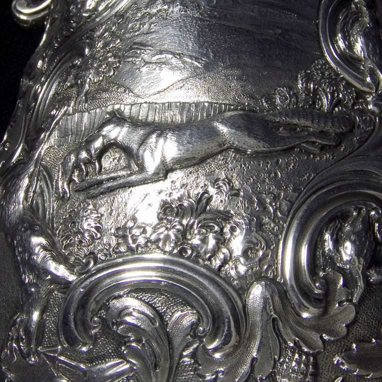 A very interesting William IV silver dome topped tankard. Decorated with original chasing the lid and foot having beautifully worked shell borders. The body being chased in high relief with hunting and shooting scenes depicting animals,birds and