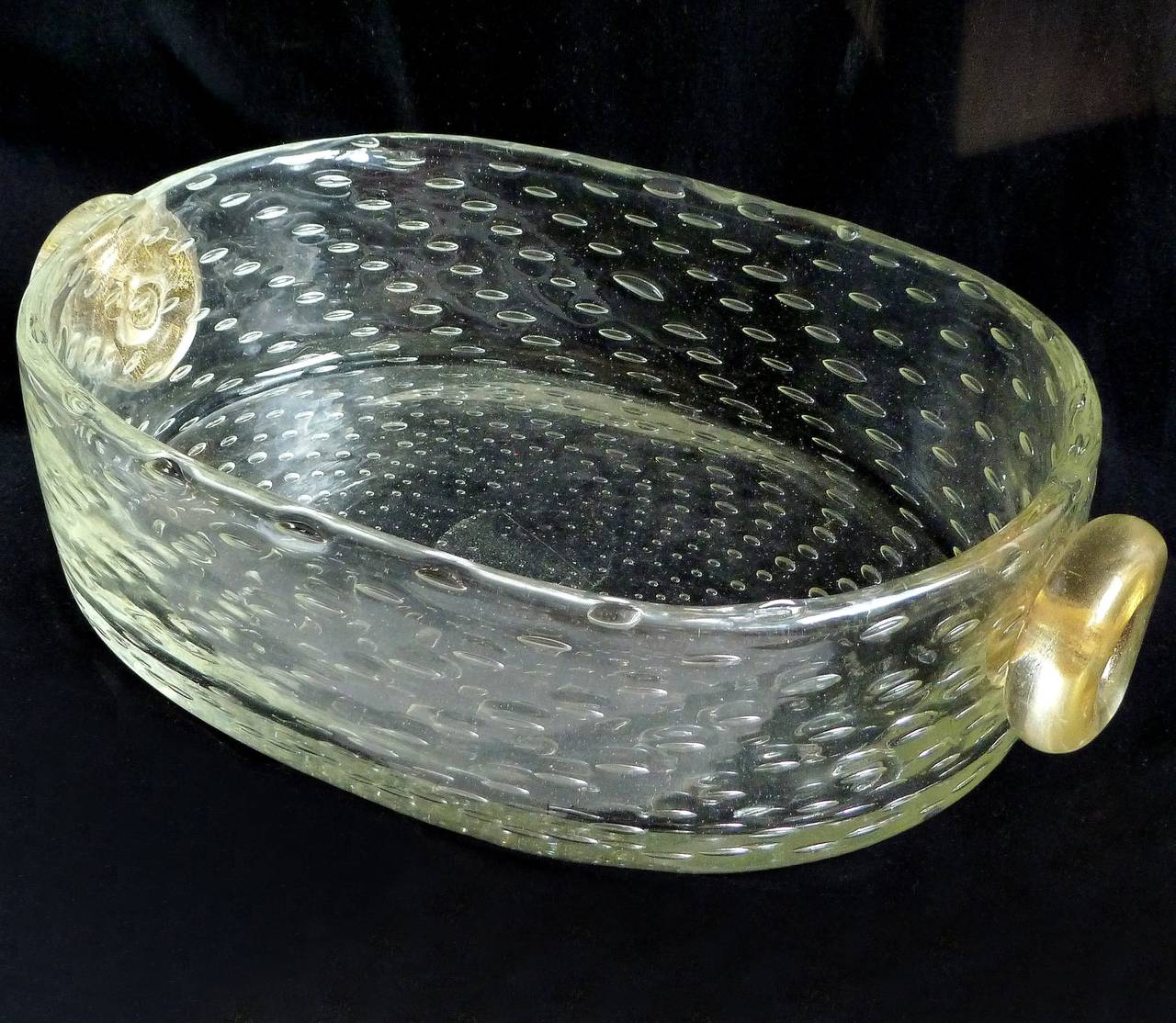 FREE Shipping Worldwide! See details below description.

Chick and Elegant Murano Hand Blown Controlled Bubbles with Gold Flecks Medallions Art Glass Jewelry Tray / Bowl. Attributed to the Seguso Vetri D' Arte company, circa 1940s. Perfect for