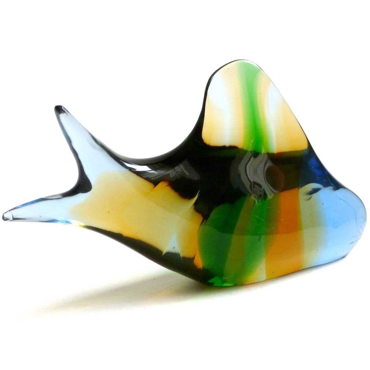 FREE Shipping Worldwide! See details below description.

Gorgeous Hand Blown Color Stripes Art Glass Fish Sculpture. It is marked with the Exbor Glassworks Czechoslovakia stamp. Designed by Josef Rozinek and Stanislav Honzik, circa 1950s. It has