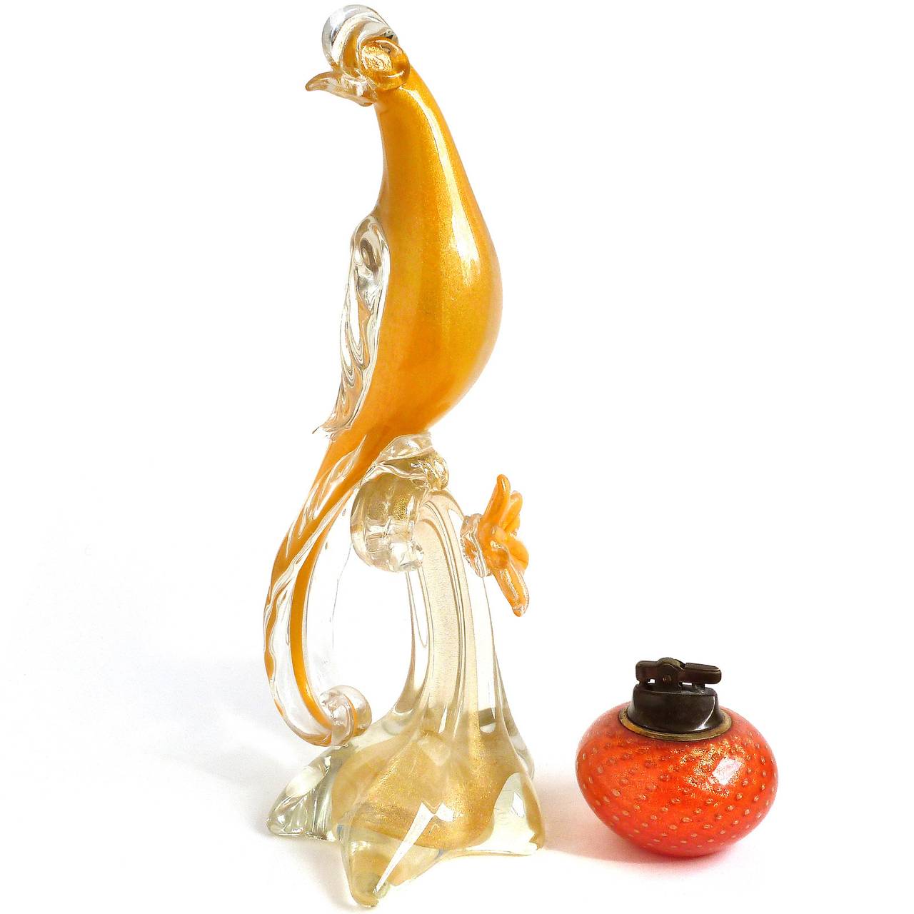 FREE Shipping Worldwide! See details below description.

Very Unusual Murano Hand Blown Bright Yellow Orange and Gold Flecks Art Glass Bird of Paradise Sculpture. Documented to Alfredo Barbini, circa 1950-1960s. The bird sits on a gold branch with