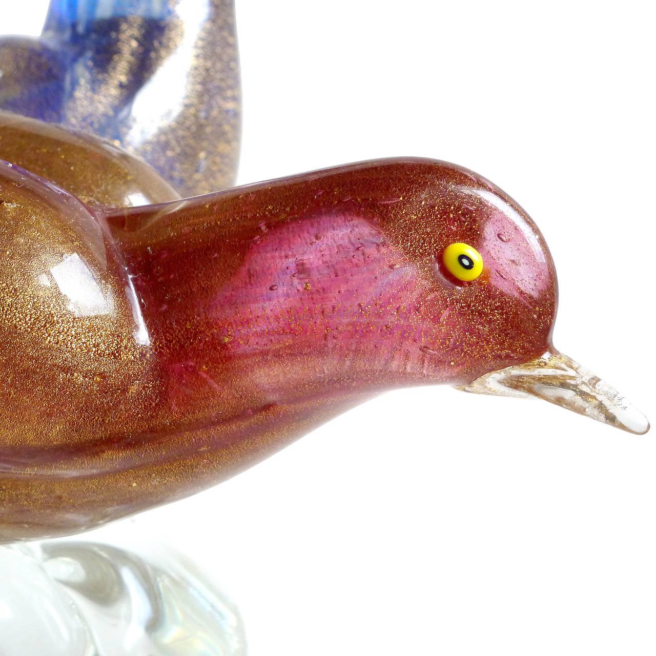 FREE Shipping Worldwide! See details below description.

Lovely Murano hand blown red-pink, blue and gold flecks art glass courting birds sculpture. Documented to the Aureliano Toso company. Each bird is made with color pigments, and covered in