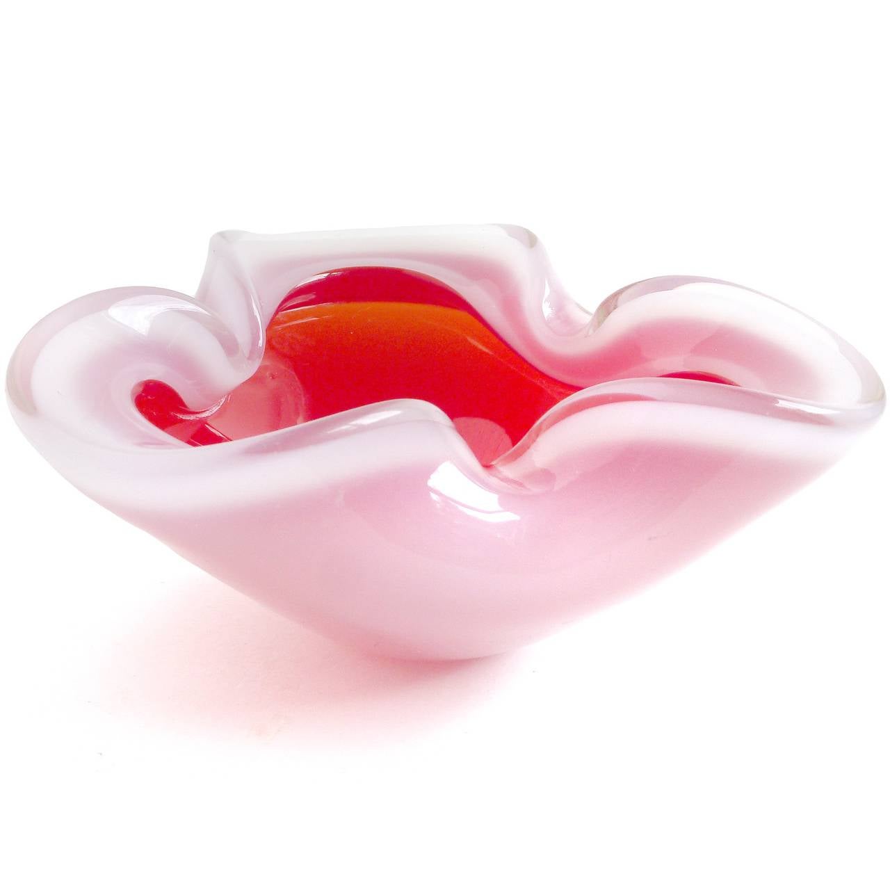 FREE Shipping Worldwide! See details below description.

Beautiful Murano hand blown opal white over red art glass 3 fold rim bowl. Created in the manner of glass master Archimede Seguso. Beautiful decorative piece for the vanity or side table.